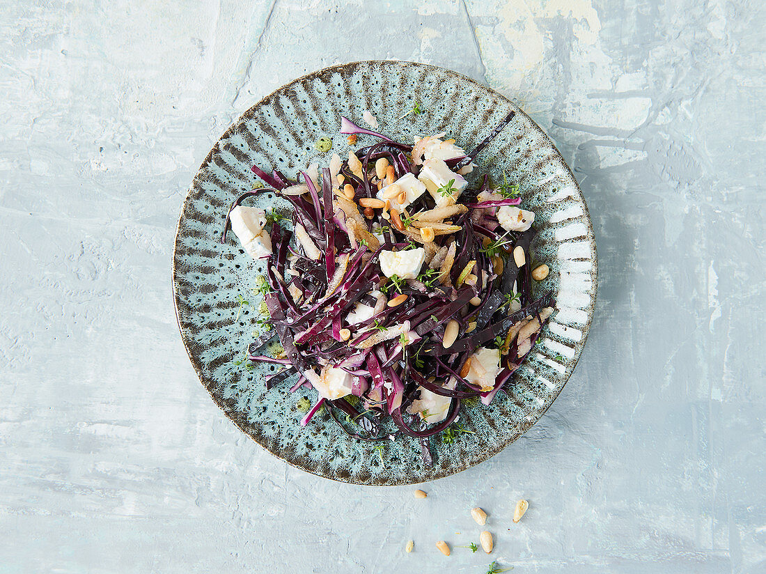 Red cabbage and pear salad with soft goat's cheese