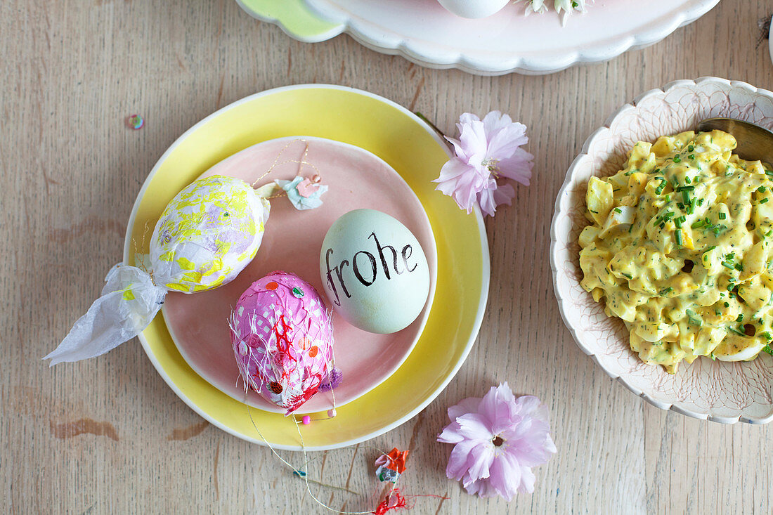 Egg mayonnaise with fresh chives and decorated Easter eggs