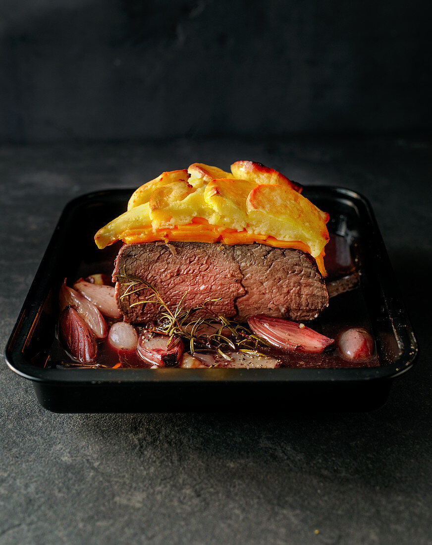 Roast beef with pumpkin and potato mash and shallot sauce