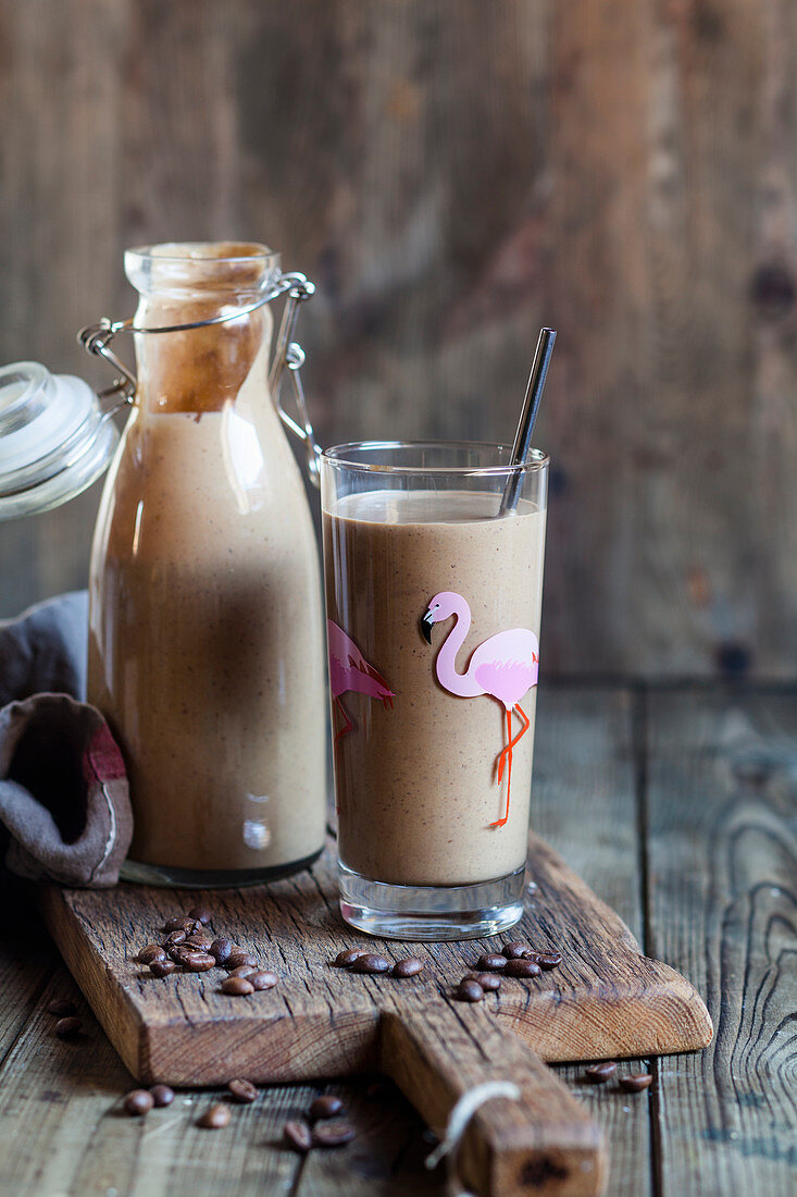 Vegan smoothies with almond milk, banana, coffee and flaxseed