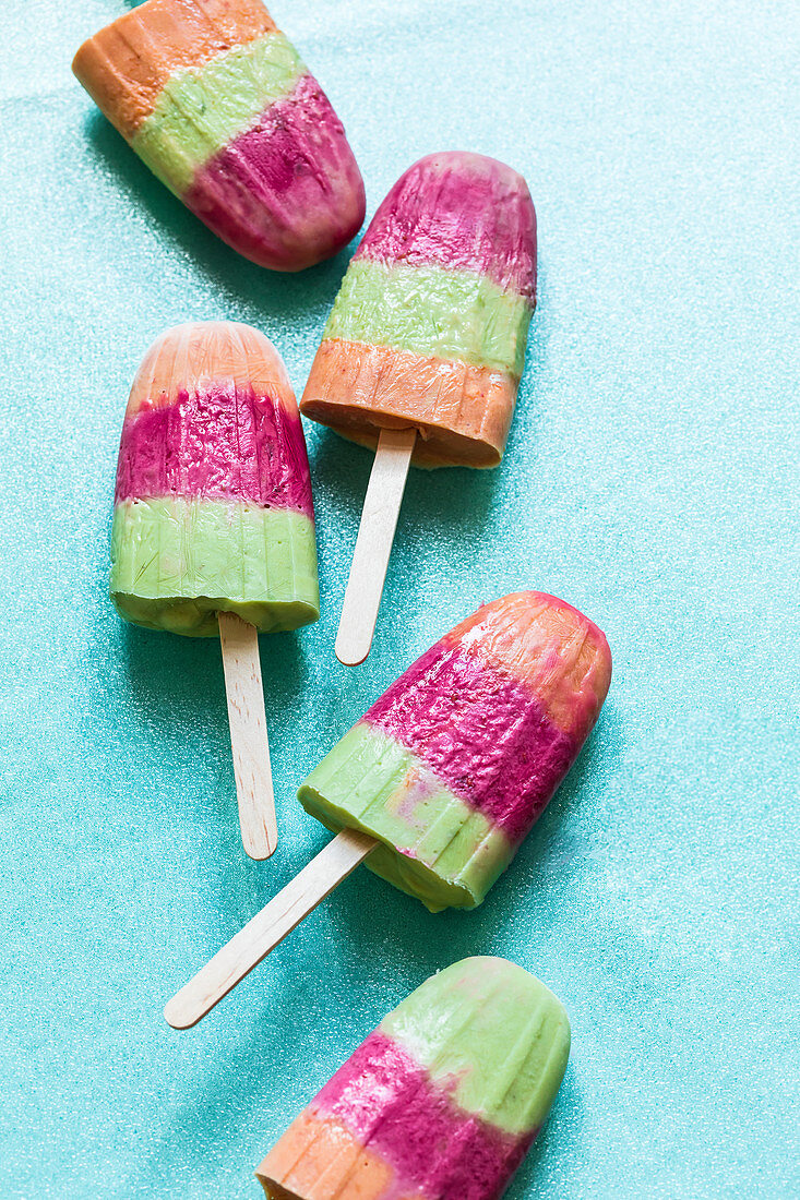Rainbow ice lollies with apricot, woodruff and raspberry