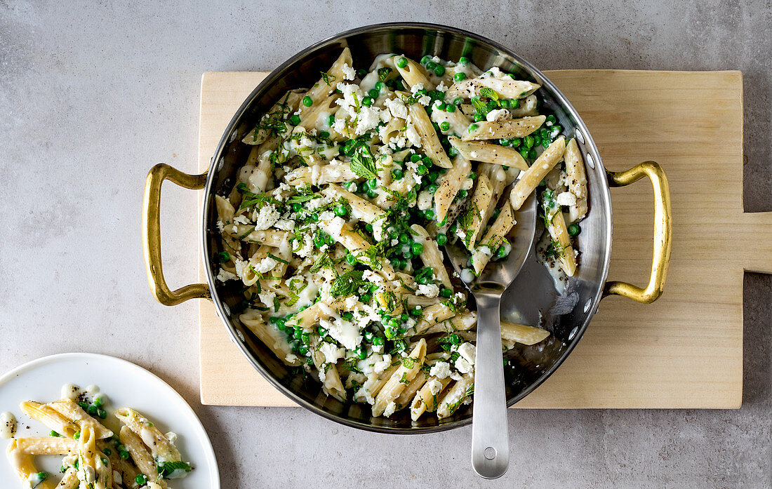 Penne pasta with peas and feta cheese