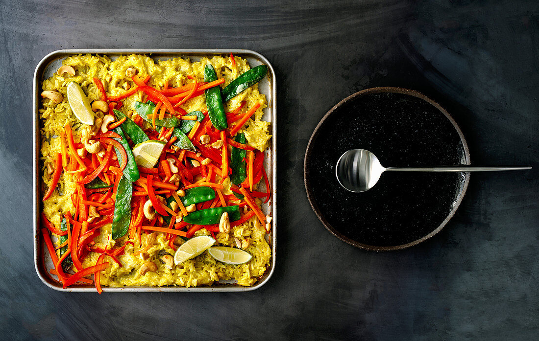 Coconut and curry rice with peppers and mange tout