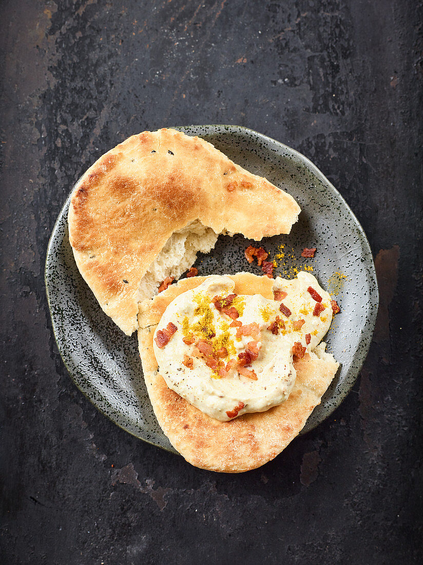 Oriental date and bacon dip with naan bread