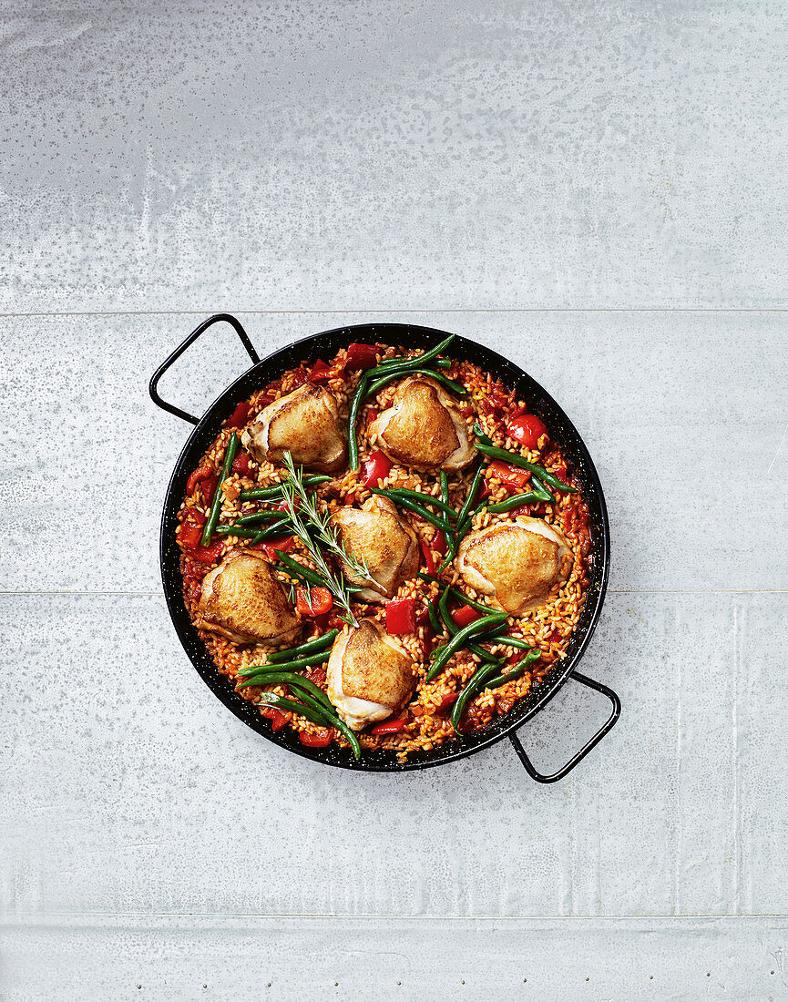 Paella Valenciana (Spain) with chicken and green beans