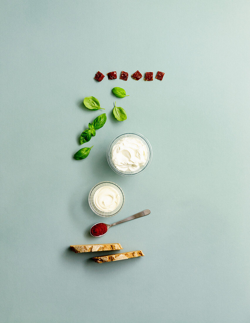 Ingredients for basil and tomato spread with cream cheese