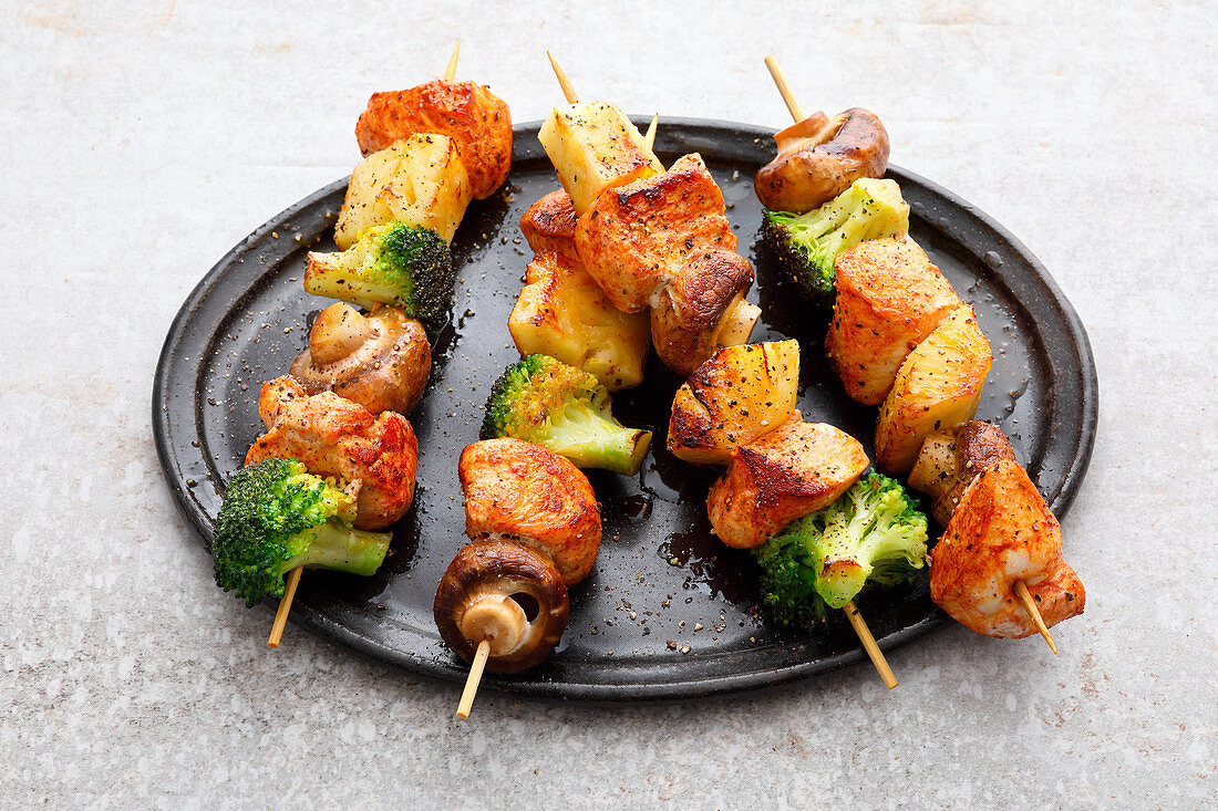 Chicken skewers with pineapple and mushrooms