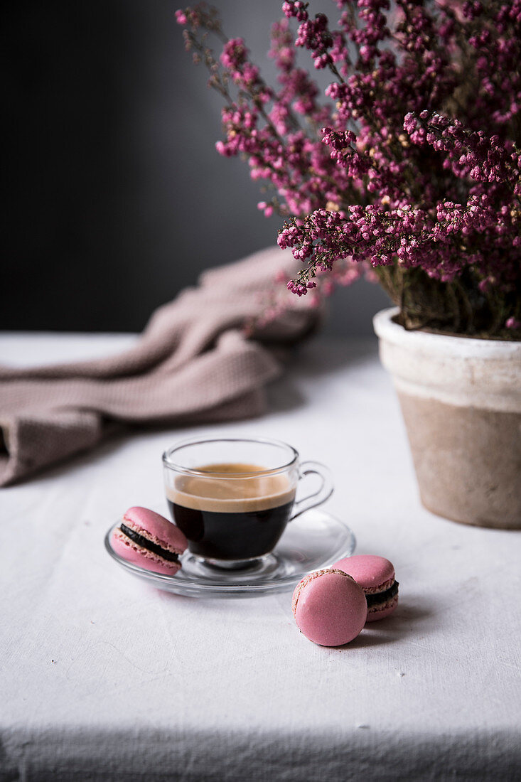 Cup of espresso with macaroons