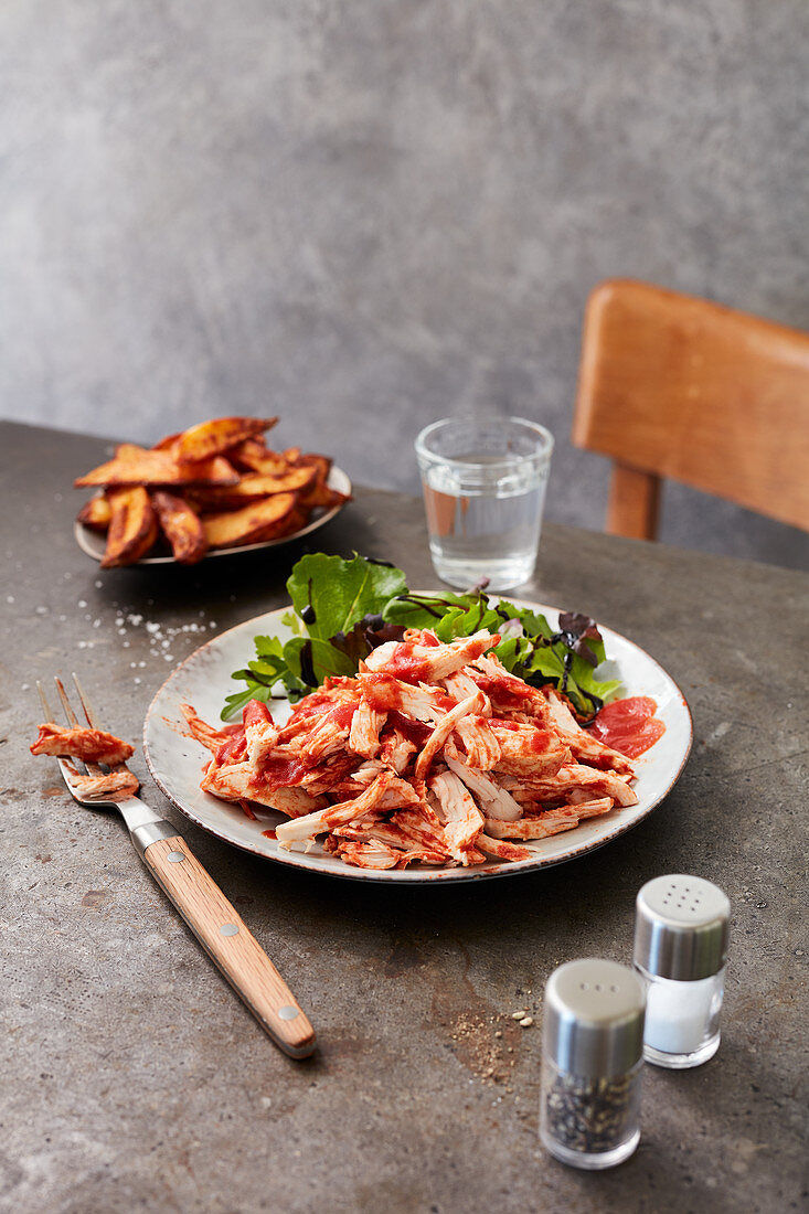 Pulled chicken with chips and salad