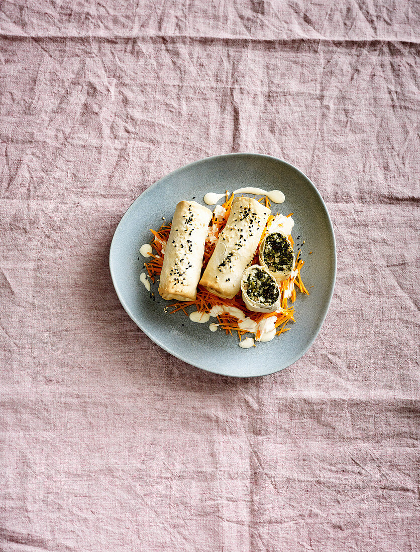 Vitamin-rich kale strudel with sheep's cheese and carrot strips