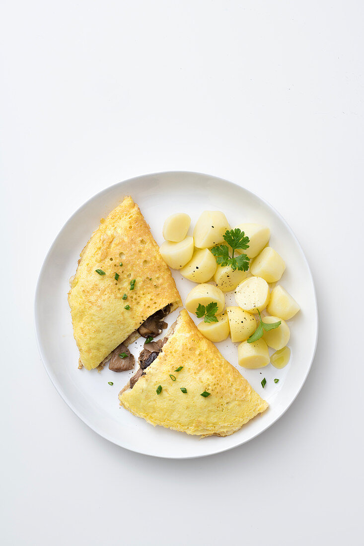Luftiges Grana Padano-Omelett mit Steinpilzfüllung