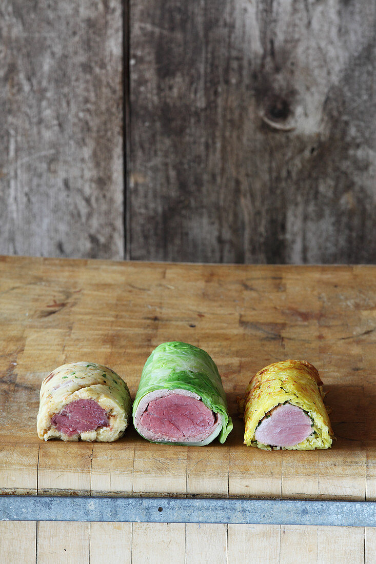 Stuffed cabbage leaves with veal fillet and pork tenderloin, wrapped in a potato coating