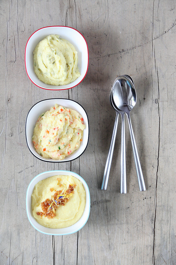 Mashed potato variations with vegetables, olives and buttered breadcrumbs