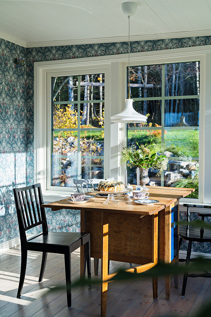 Wooden table in vintage conservatory