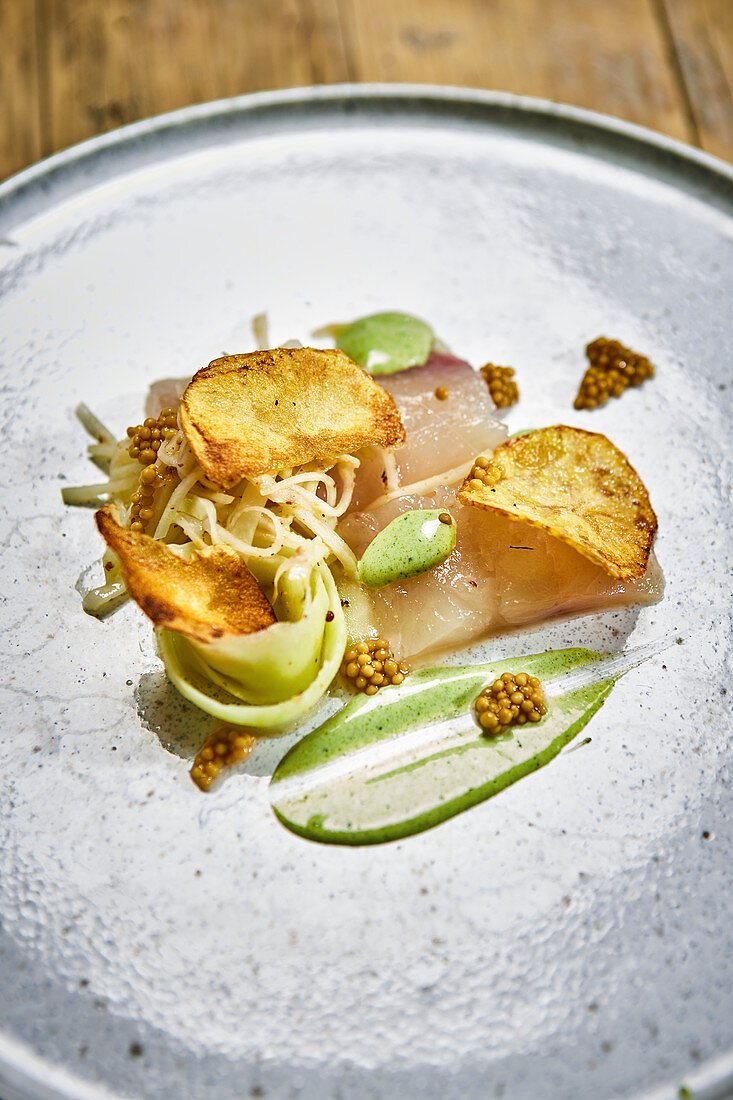 Pickled salmon with mustard kohlrabi and potato crisps