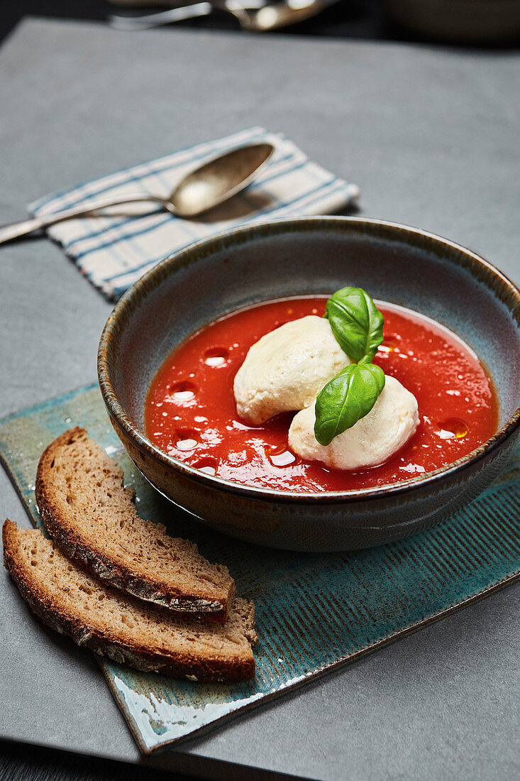 Salsiccia and tomato soup with quark dumplings