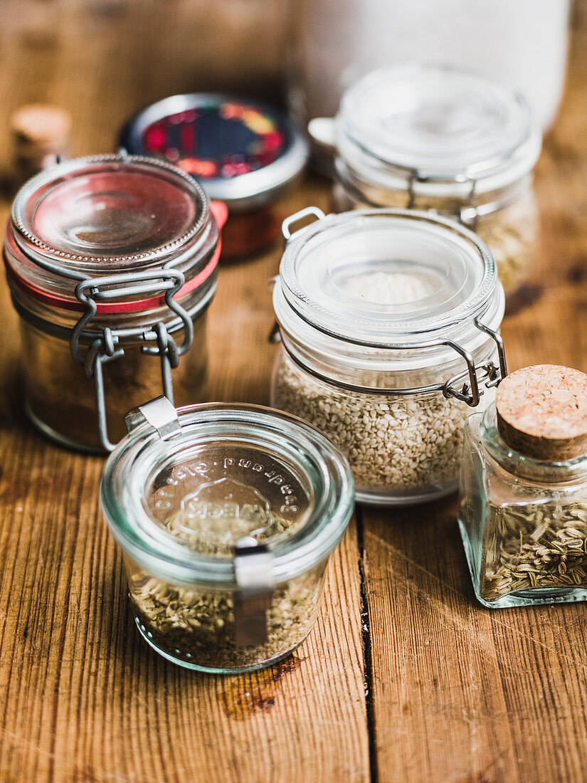 Spices and seeds in storage jars