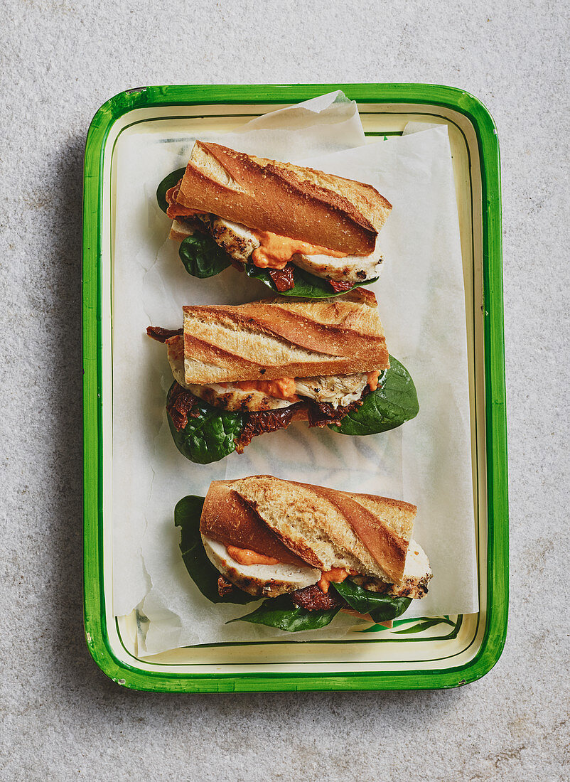Baguette with chicken breast, spinach and dried tomatoes