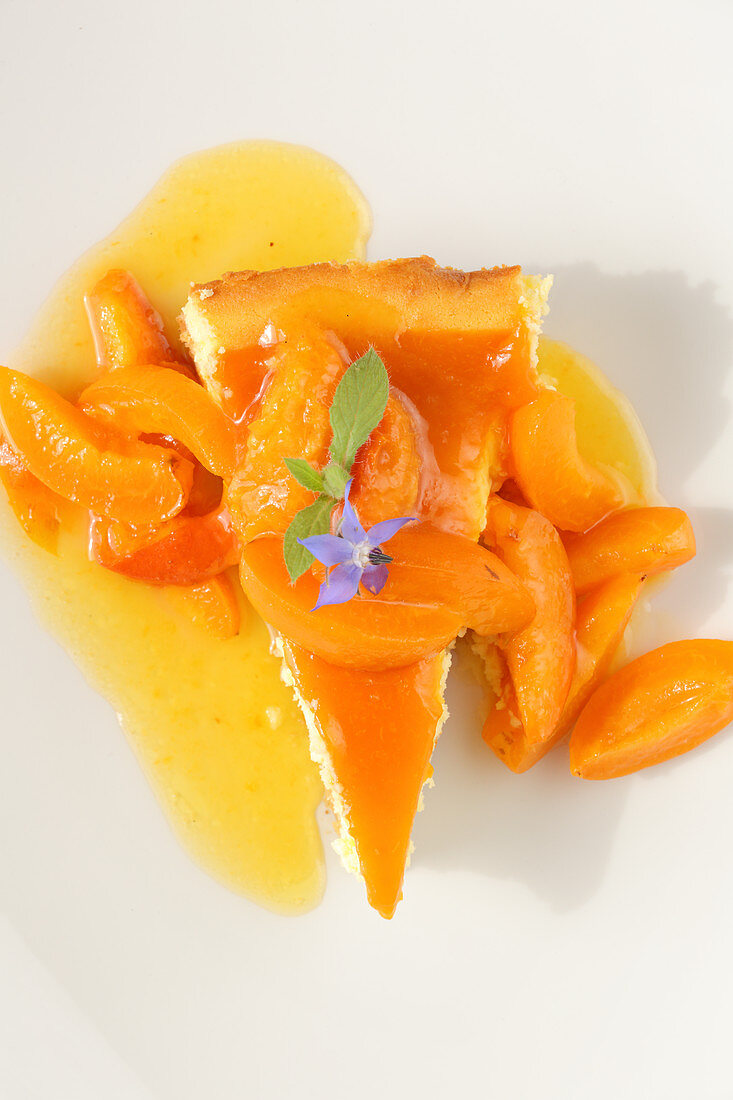 A piece of apricot tart with apricots