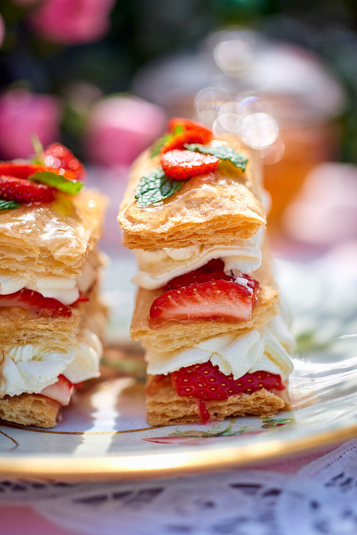 A mille feuille with cream and strawberries