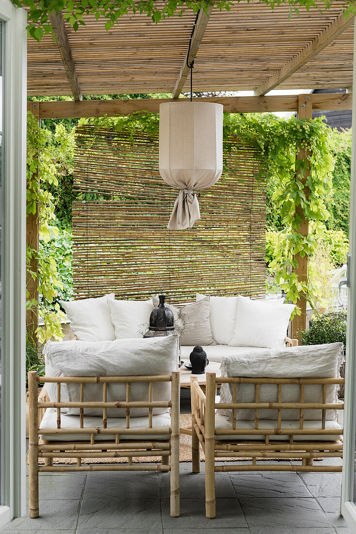 Bamboo furniture on Oriental-style roofed terrace