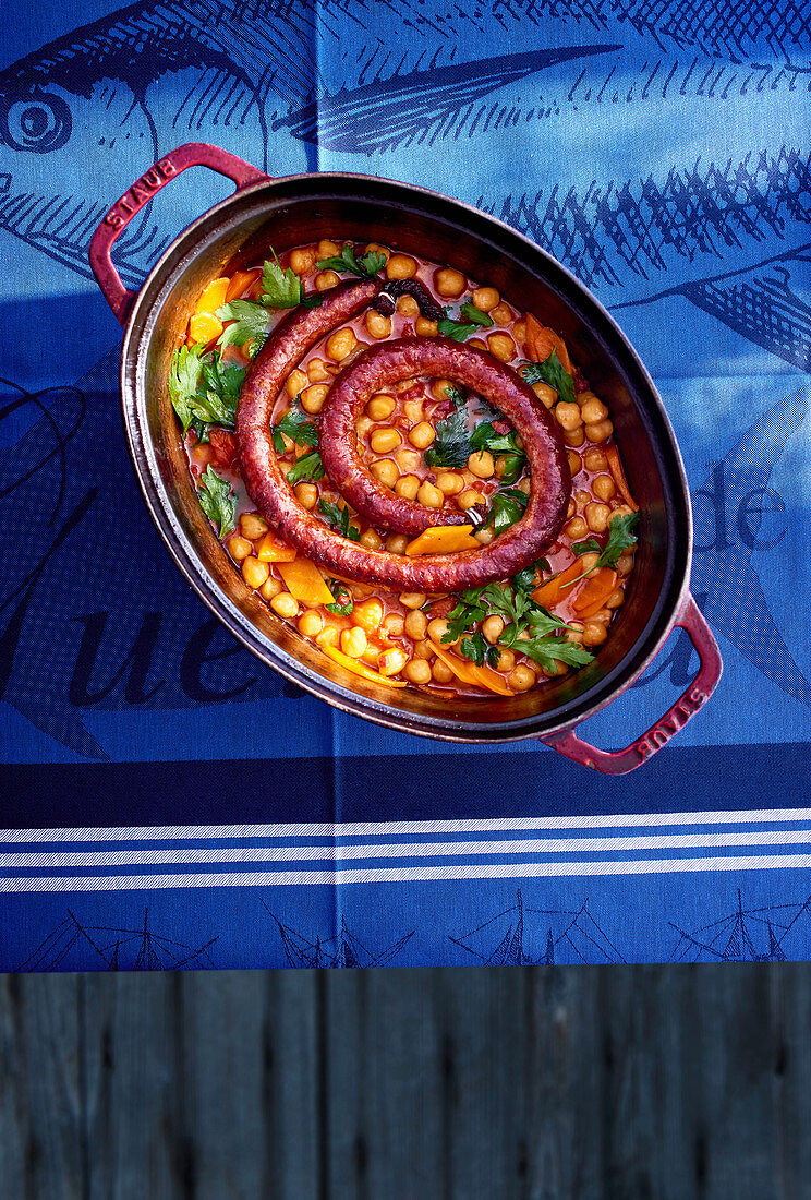 Chistorra (Basque pepper sausage) in a chickpea stew