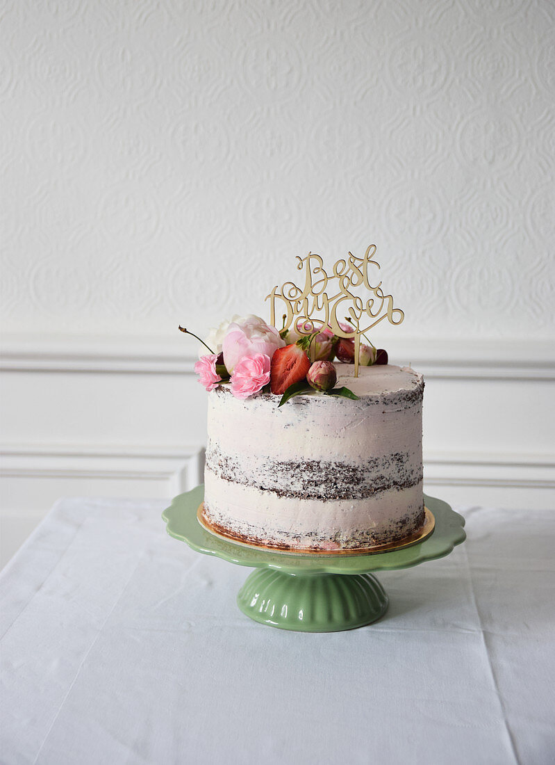 A naked cake decorated with flowers