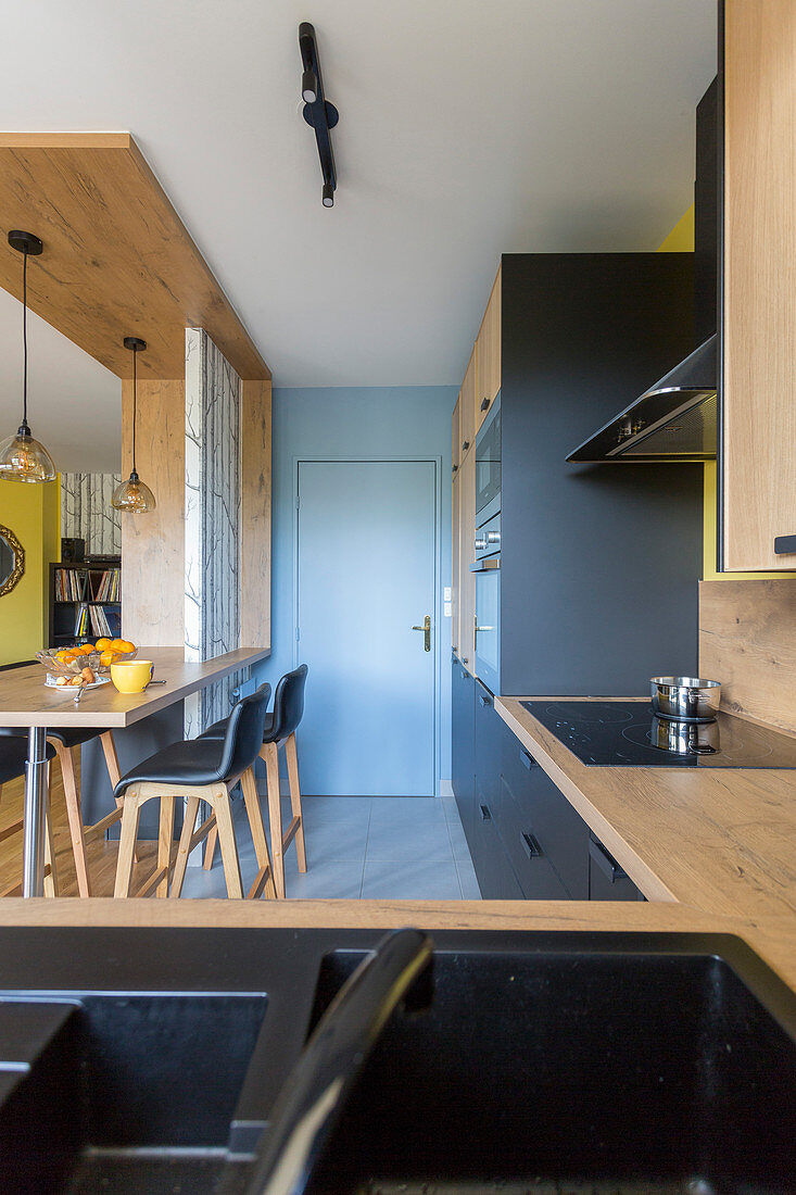 Modern kitchen-dining room in a natural style