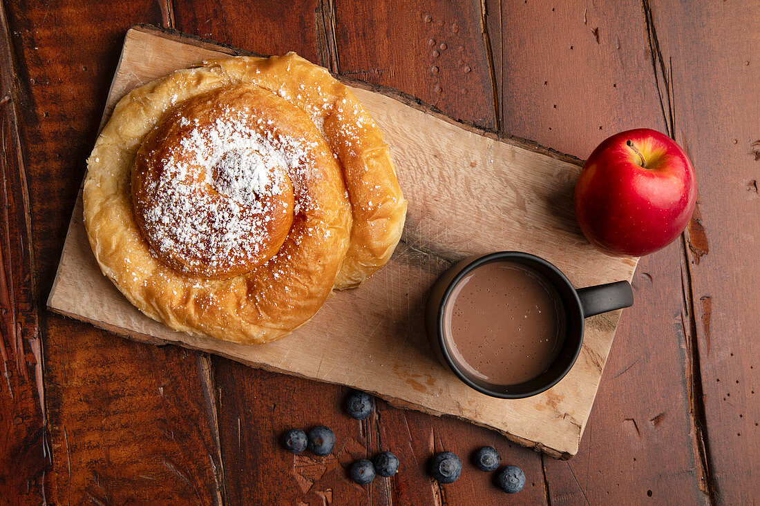 Ensaïmada de Mallorca (yeast dough pastry) with icing sugar