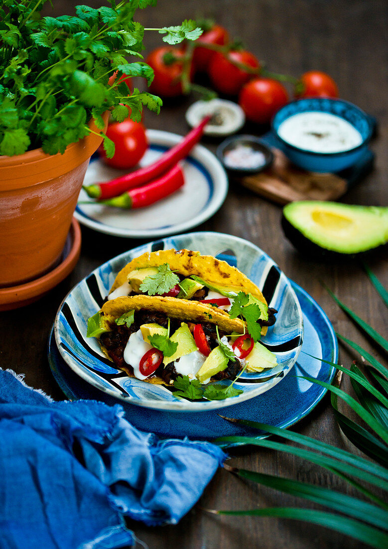 Veggie tacos with avocado, chilli and coriander