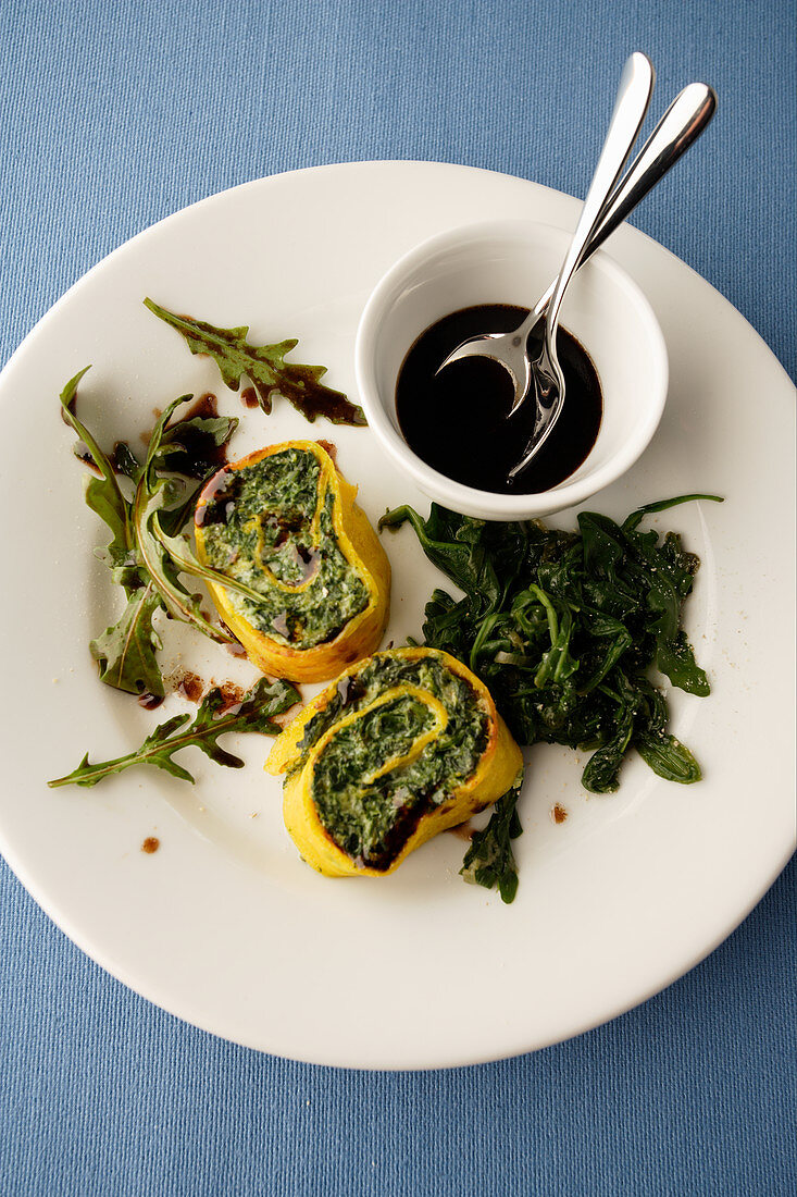 Omelette rolls filled with spinach