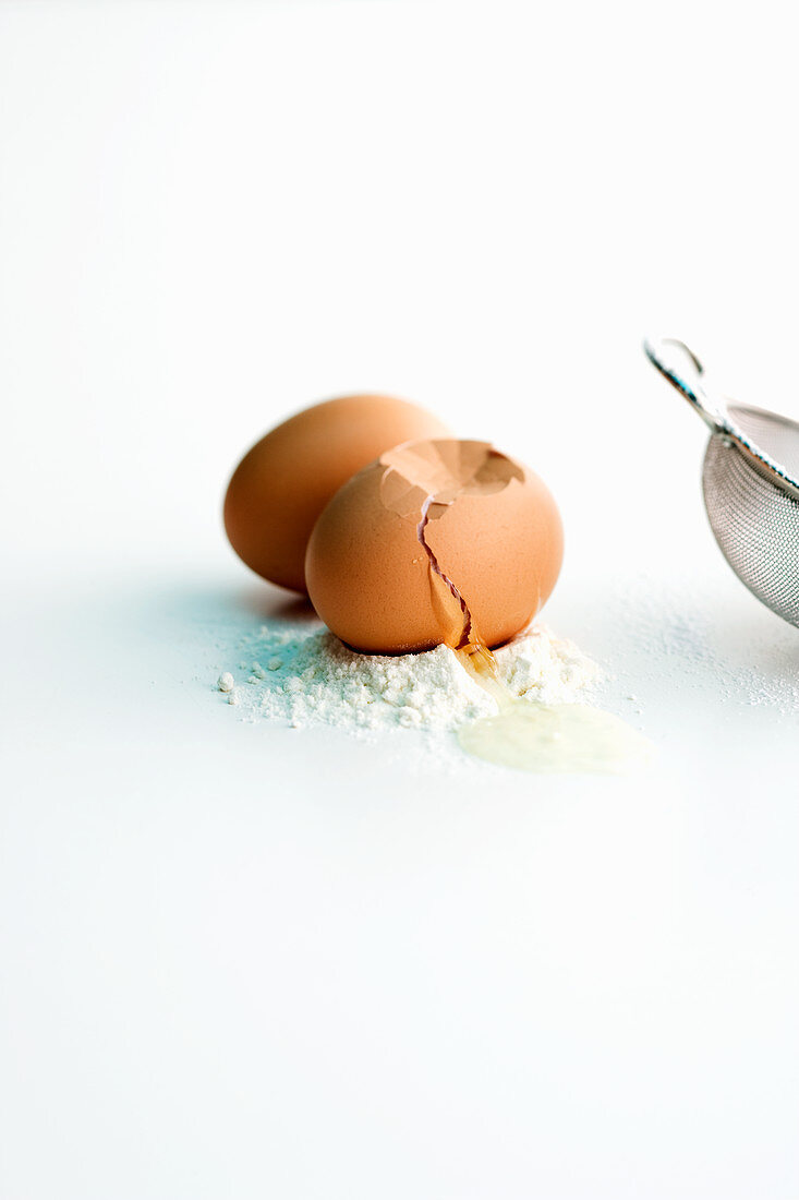 Eggs and flour as ingredients for making shredded pancakes