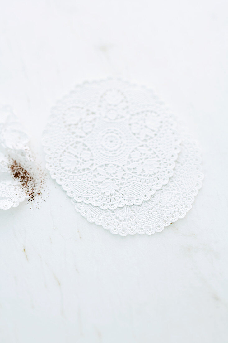 Doilies on a marble surface