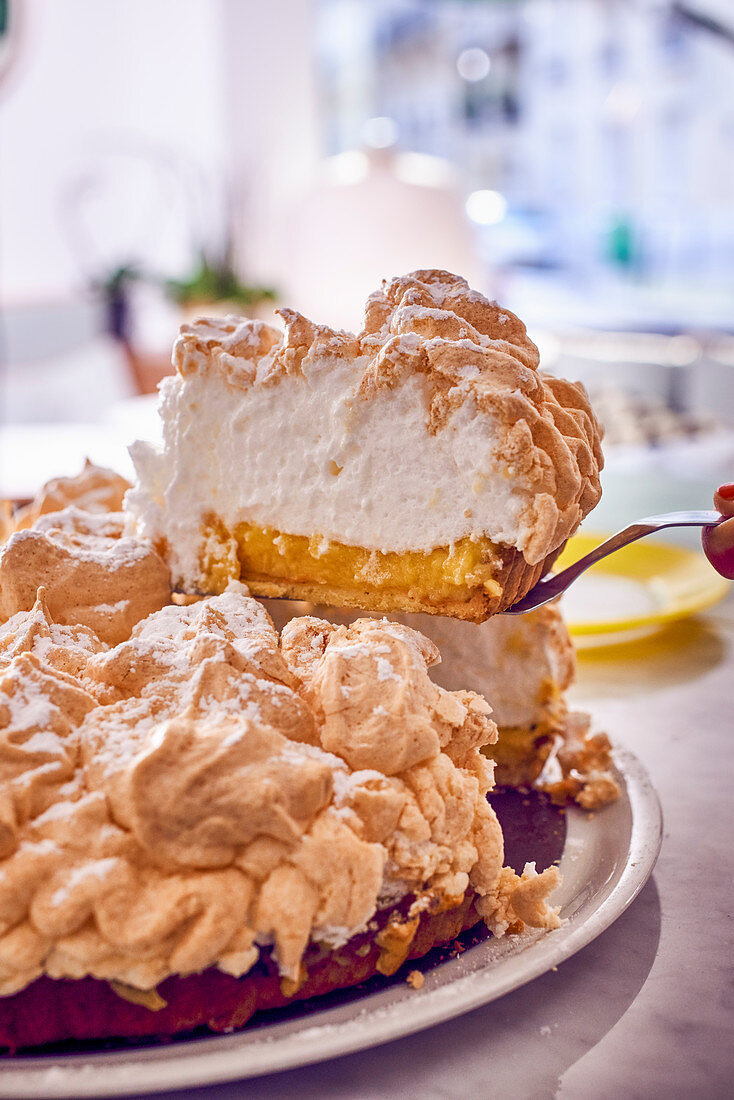 Lemon meringue tart, sliced