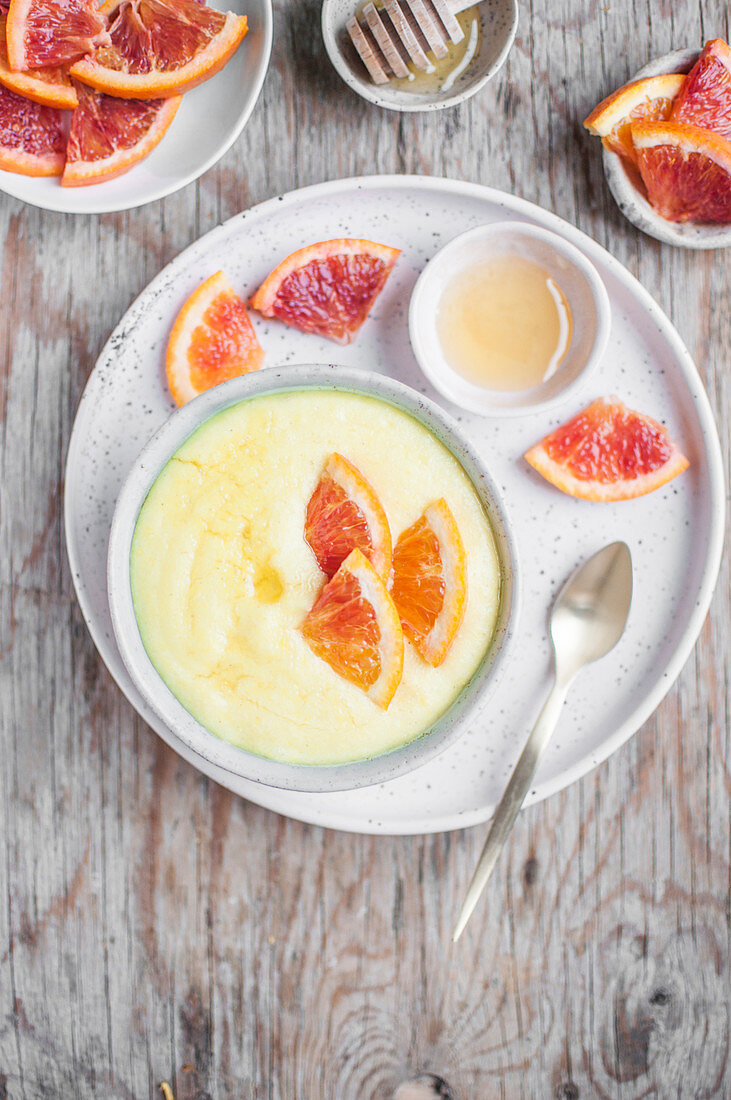 Millet pudding with bloody orange and honey
