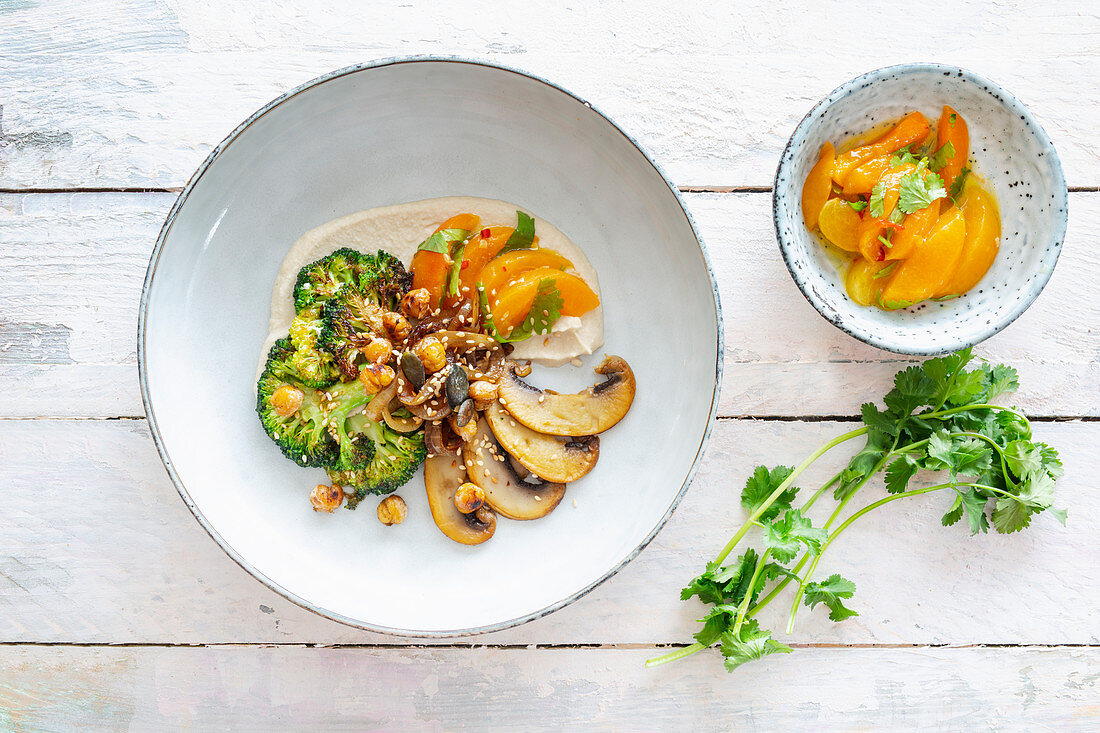 Roasted broccoli with Portobello mushrooms, chilli apricots and hummus (vegan)