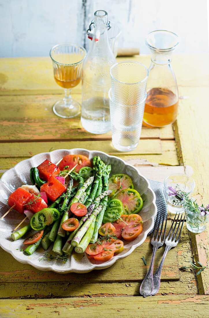 asparagus and tomato salad with grilled melon skewers
