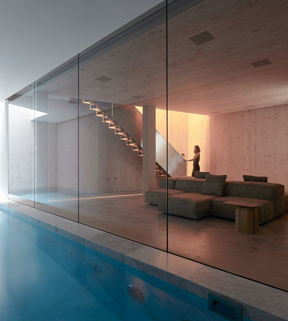 Pool and lounge in cellar of modern, architect-designed house