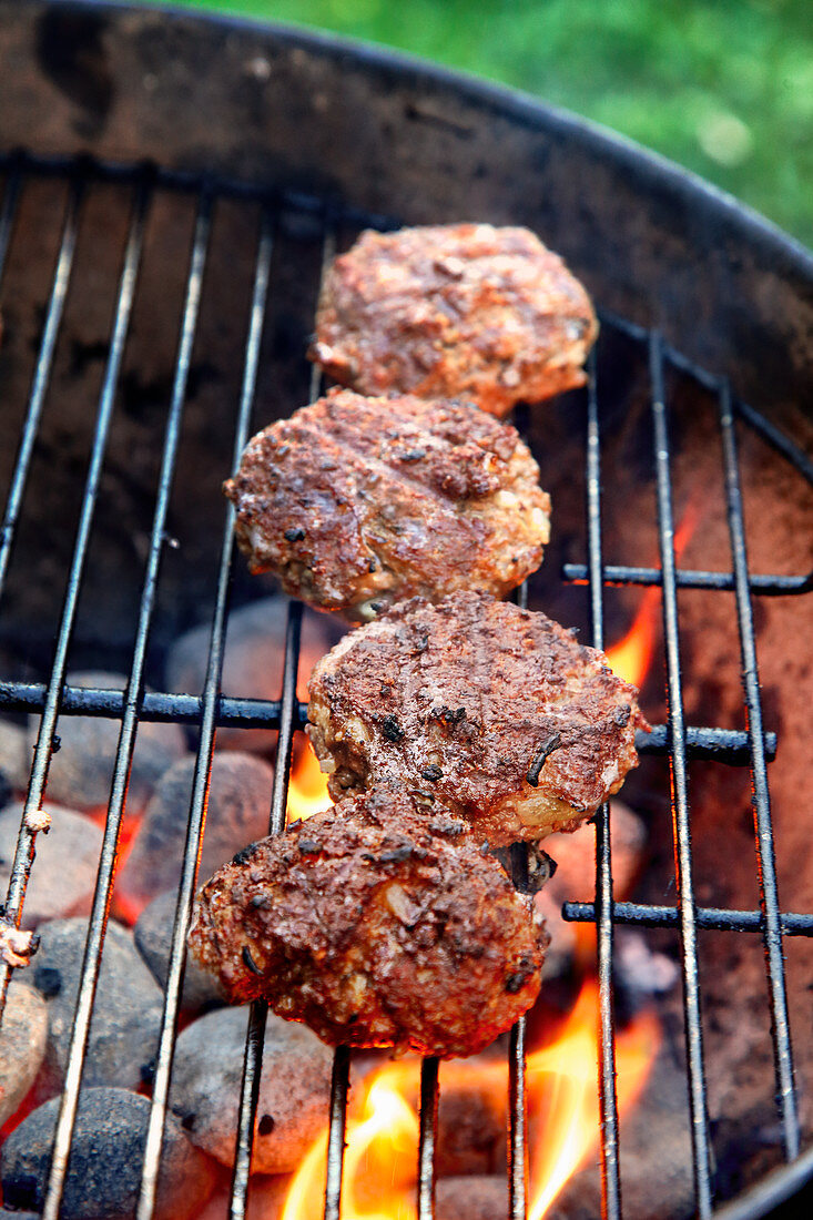 Burgers on a barbecue