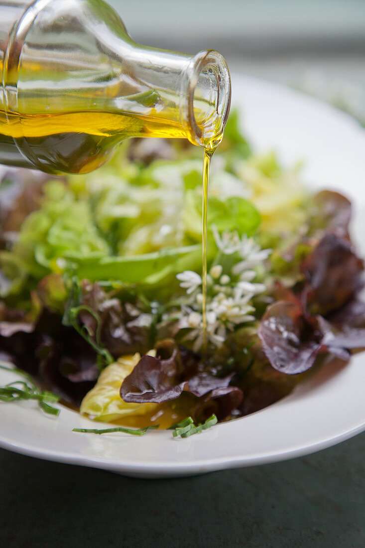 A mixed leaf salad drizzled with wild garlic oil