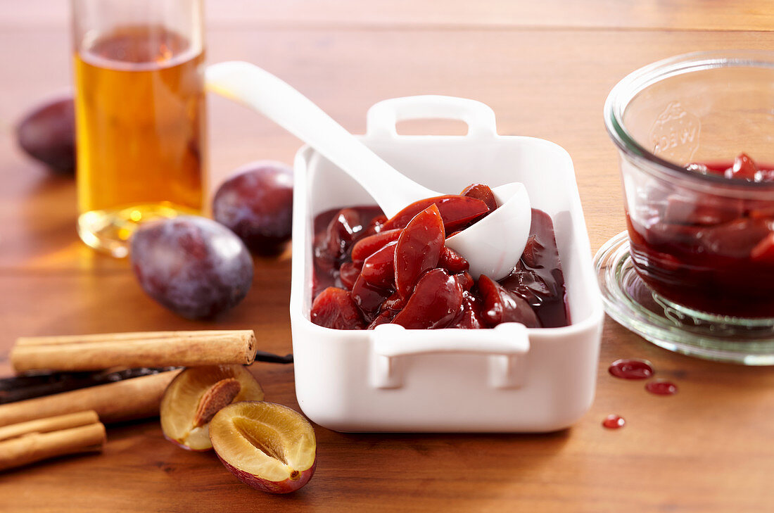 Damsons stewed in red wine and rum with cinnamon and vanilla