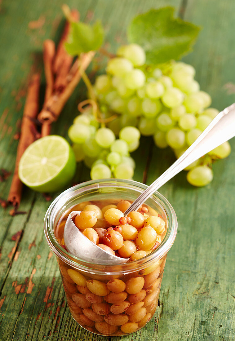 Spicy preserved grapes with lime, vanilla, cinnamon, cloves, pepper and raspberry brandy