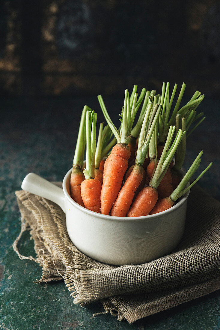 Fresh carrots in a saucepan