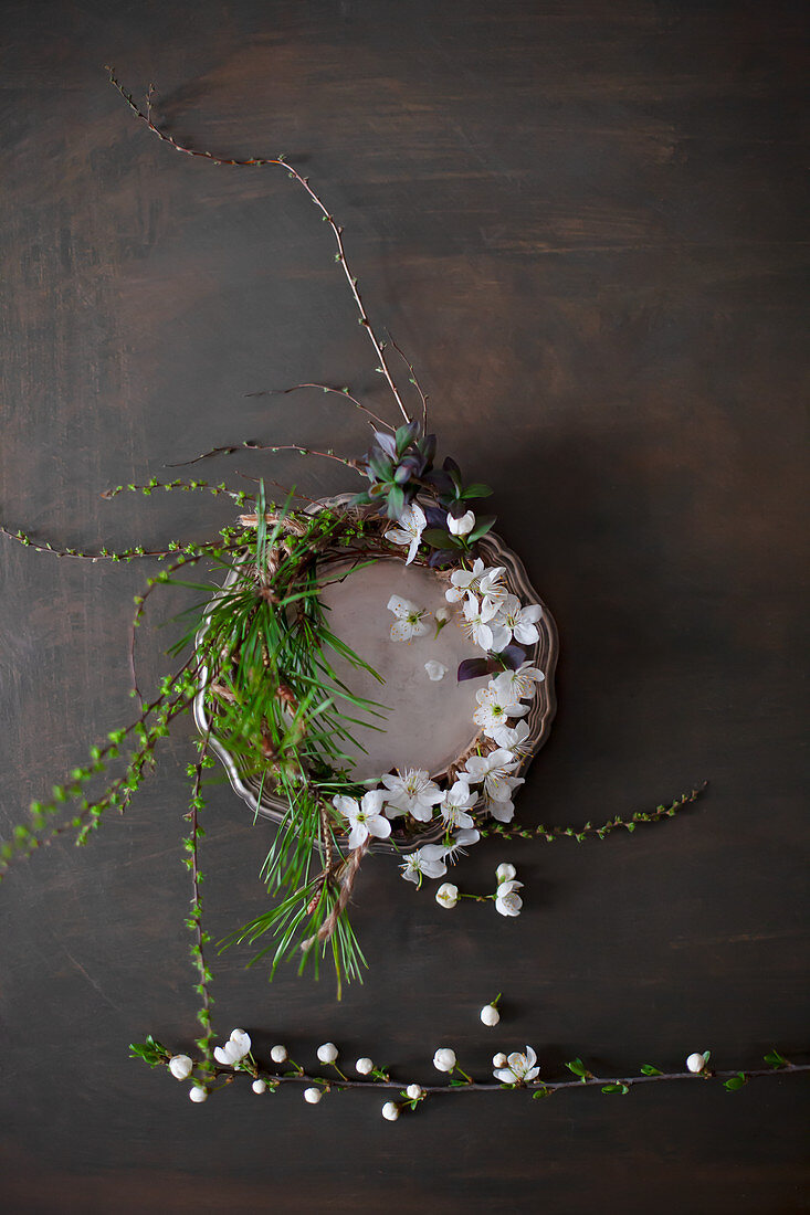 Spring wreath on pewter plate