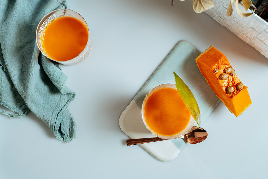 Mango and pumping smoothie on a glass