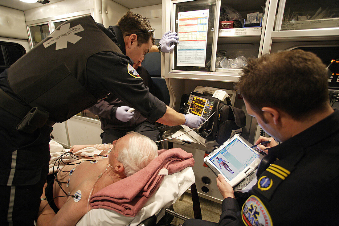 Paramedics Caring for Cardiac Patient