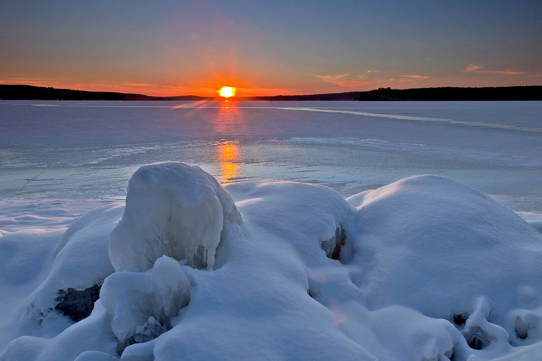 Winter Sunset on frozen Lake