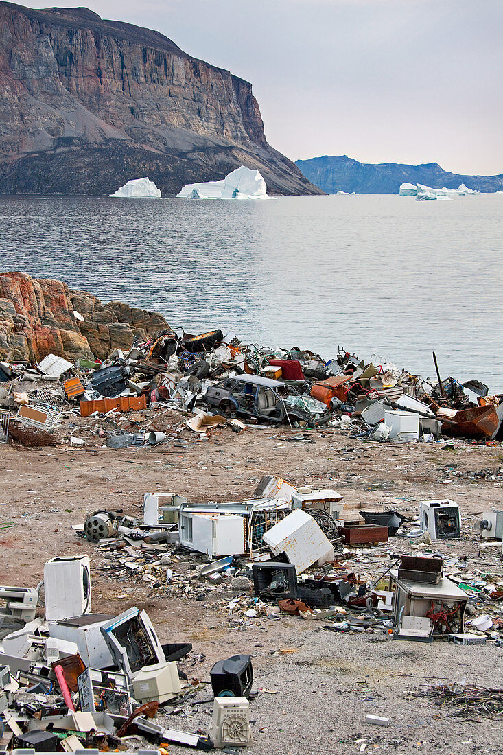 Rubbish dump and icebergs, Uummannaq, Greenland