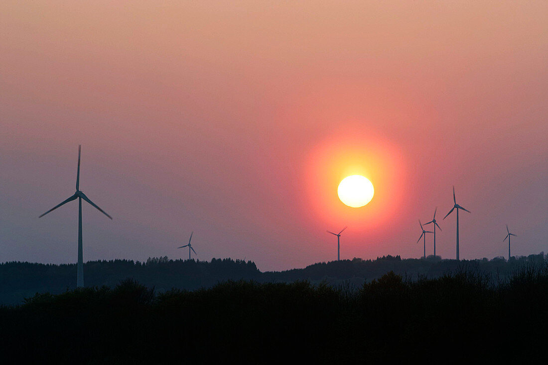 Wind turbines at sunset