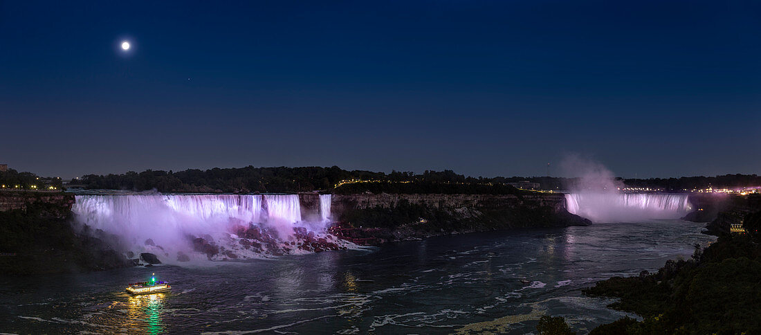 Moon above Niagara Falls at night